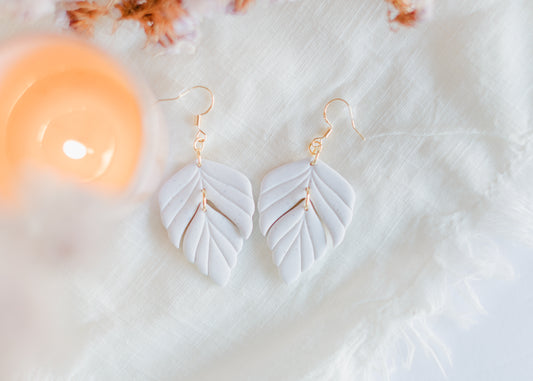 White Speckled Leaf Dangles Clay Earrings